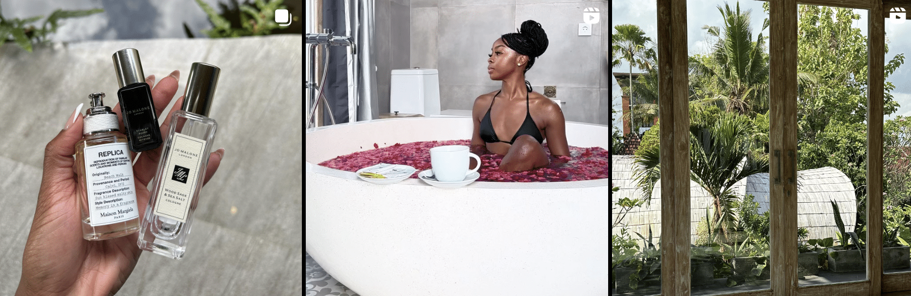 A woman is sitting in a bathtub with a bottle of perfume.