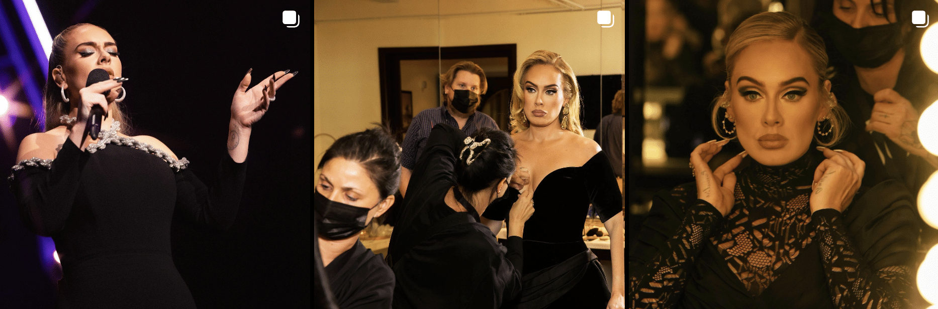 A woman in a black dress is singing in front of a mirror.