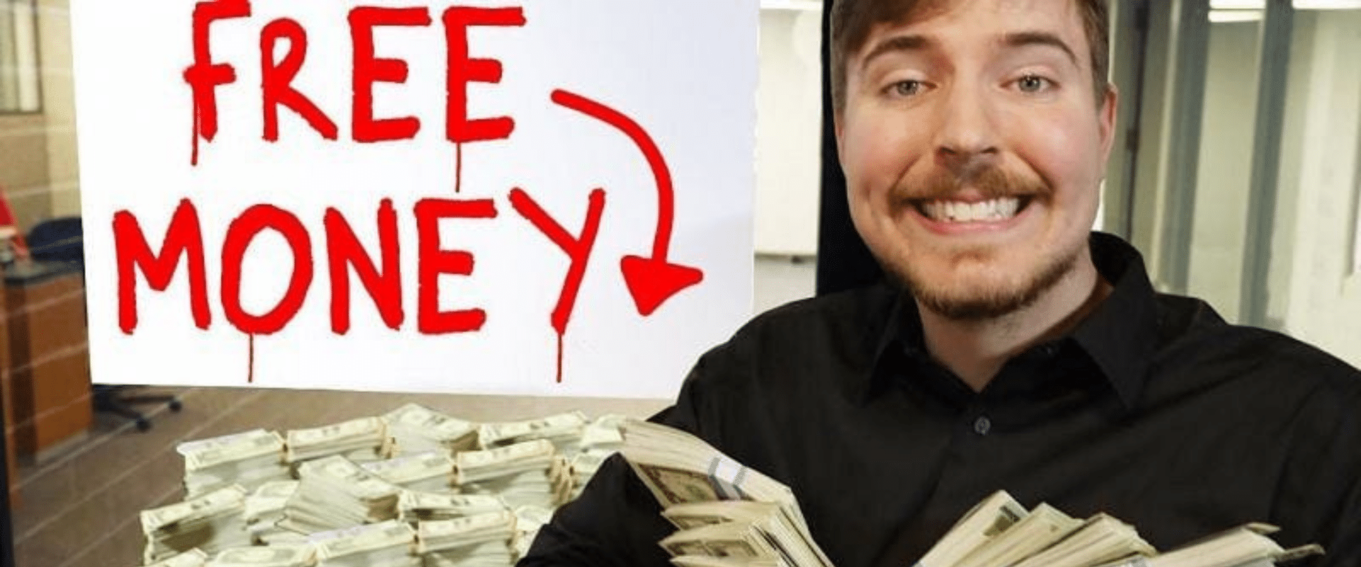 A man holding a sign that says free money.