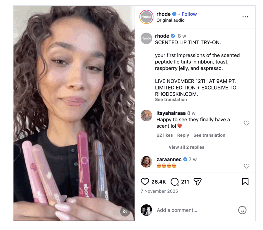 What Is Brand Advocacy? (7 Top Brand Programs Explained) 18 A woman holds three Rhode lip tints in different shades while smiling at the camera, showcasing brand advocacy; product details and launch info are in the Instagram caption.